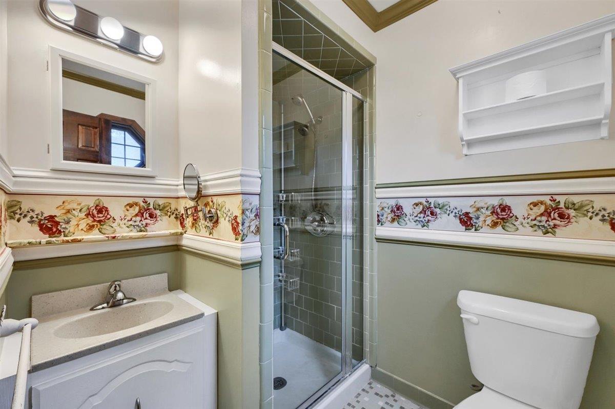 129 Barnes Road Washingtonville, NY 10992 - Photo 32 of 48 a bathroom with a sink a toilet and vanity