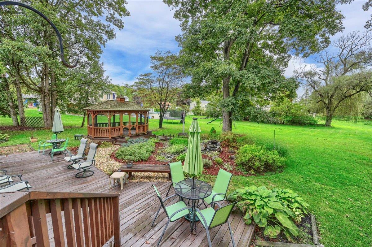 129 Barnes Road Washingtonville, NY 10992 - Photo 38 of 48 a view of a chairs and table in backyard of the house