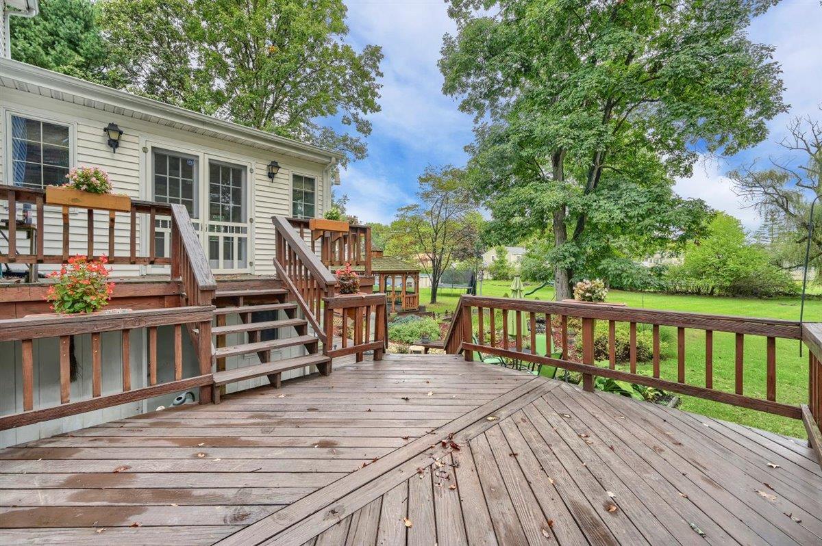129 Barnes Road Washingtonville, NY 10992 - Photo 39 of 48 a view of a house with a deck
