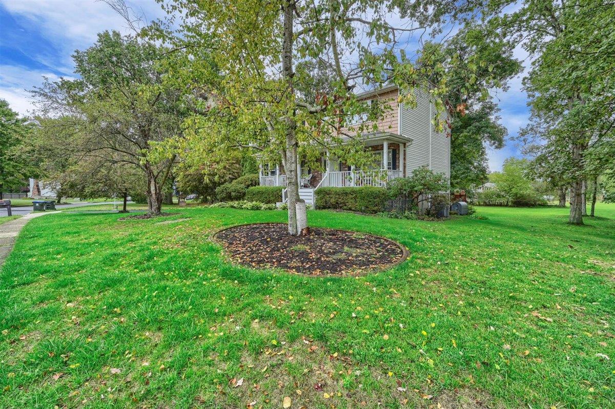 129 Barnes Road Washingtonville, NY 10992 - Photo 4 of 48 a view of a garden with a fountain