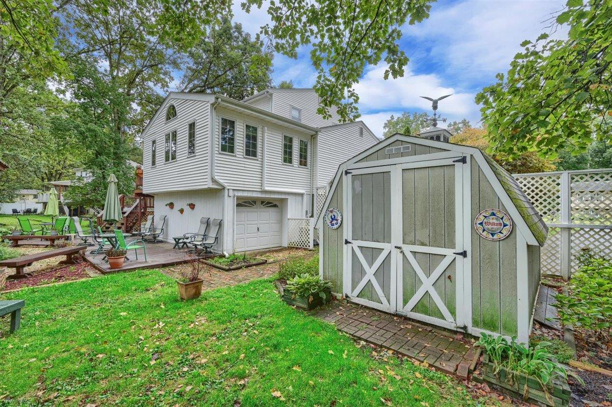 129 Barnes Road Washingtonville, NY 10992 - Photo 47 of 48 a front view of a house with garden