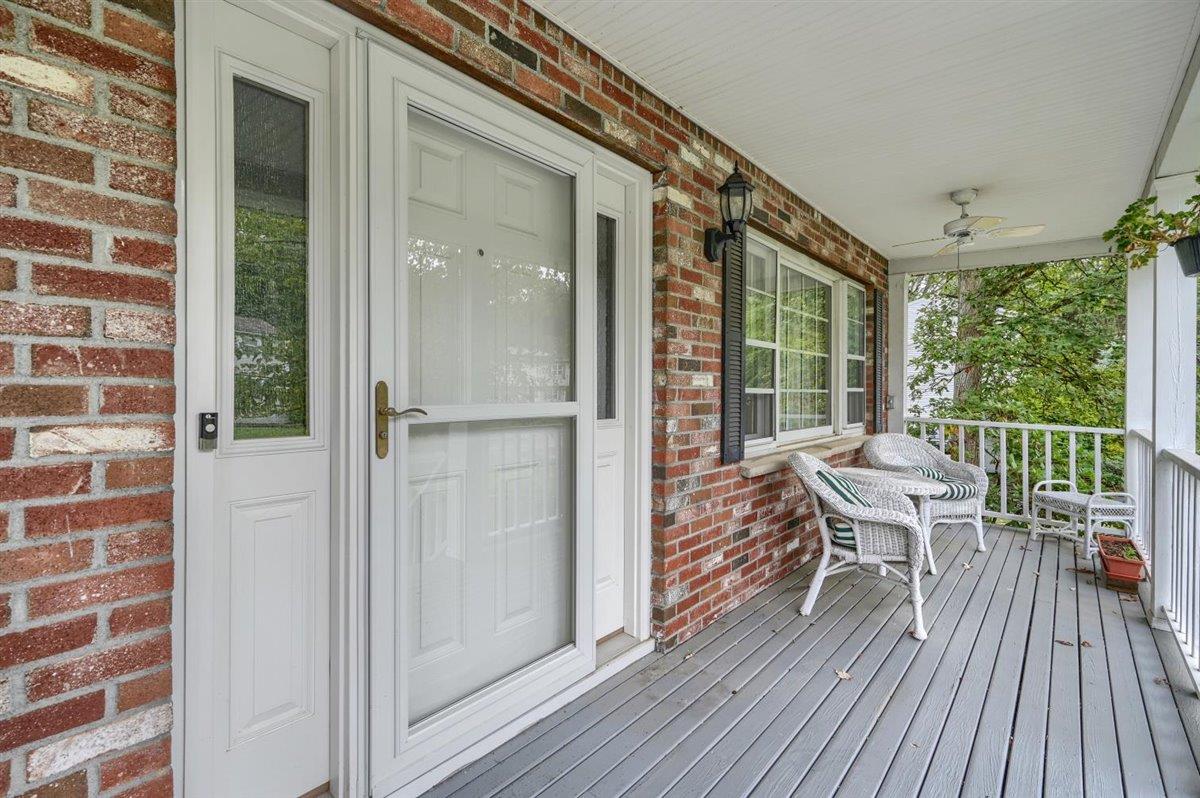129 Barnes Road Washingtonville, NY 10992 - Photo 5 of 48 a view of a balcony with table and chairs