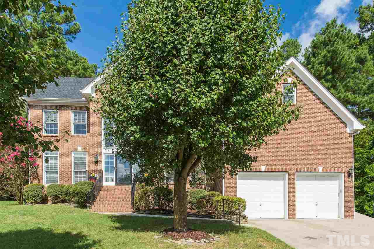 317 Hardwick Drive Durham, NC 27713 - Photo 2 of 3 a view of a house with a yard