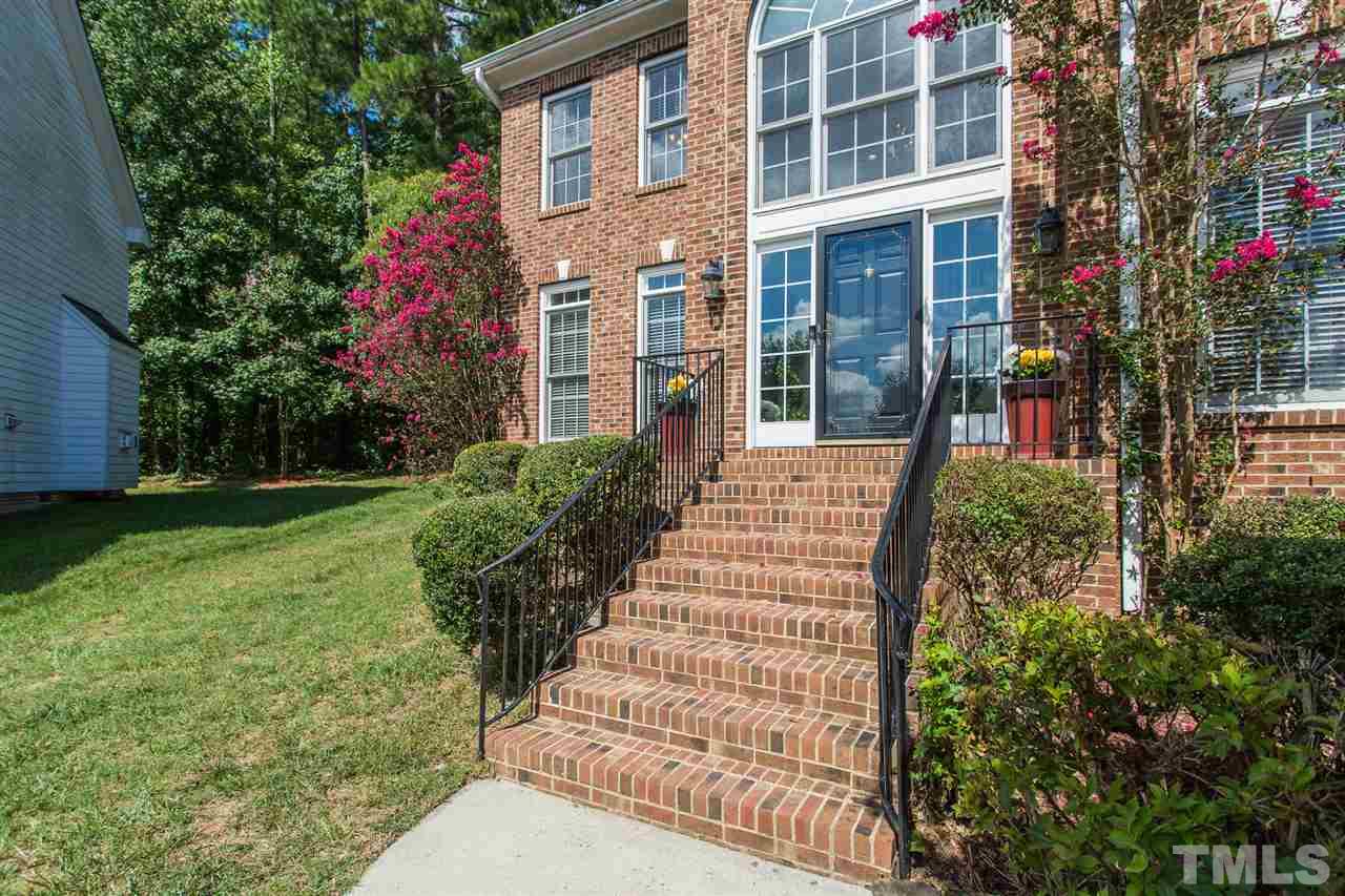 317 Hardwick Drive Durham, NC 27713 - Photo 3 of 3 a view of a house with a yard and garden