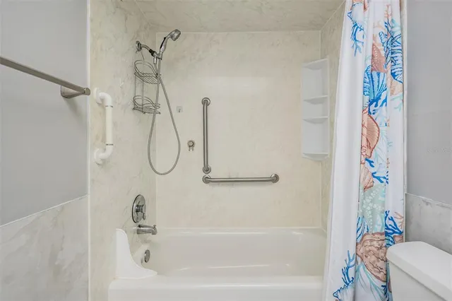 a bathroom with a bath tub