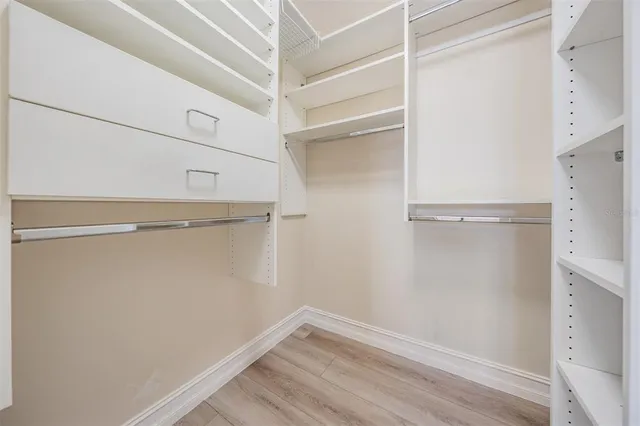 a view of an empty walk in closet