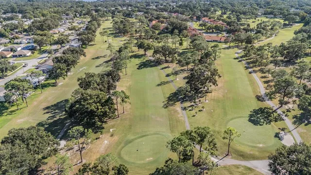 an aerial view of residential house with outdoor space