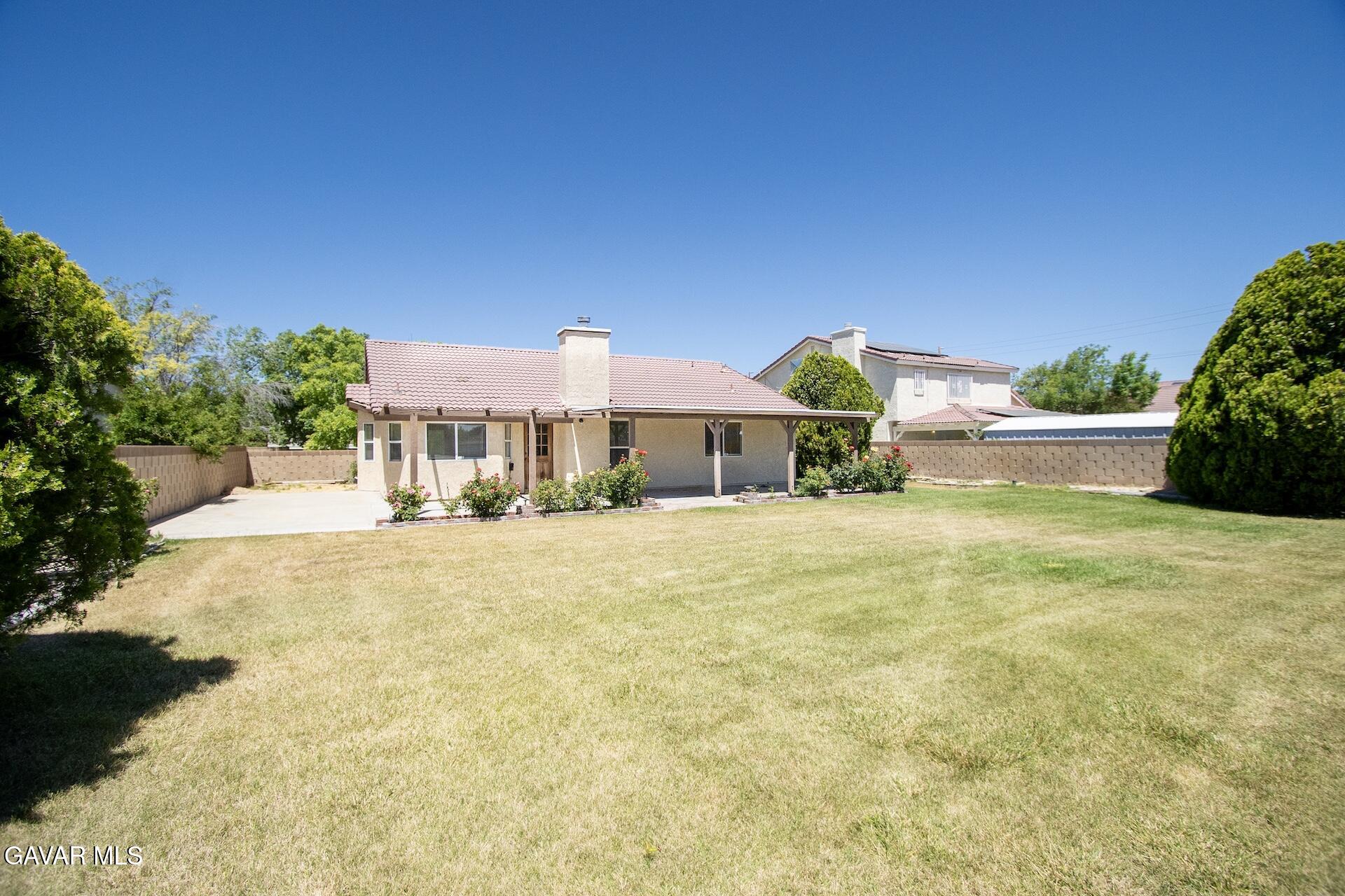 44318 33rd Street West Lancaster, CA 93536 - Photo 7 of 29 a front view of house with yard