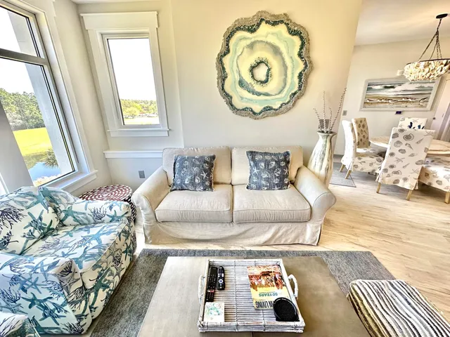 a living room with a couch and a table