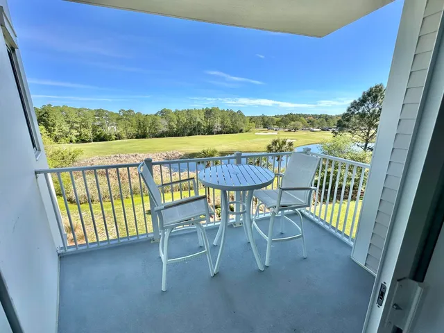 a bathroom with a sink a mirror and a shower