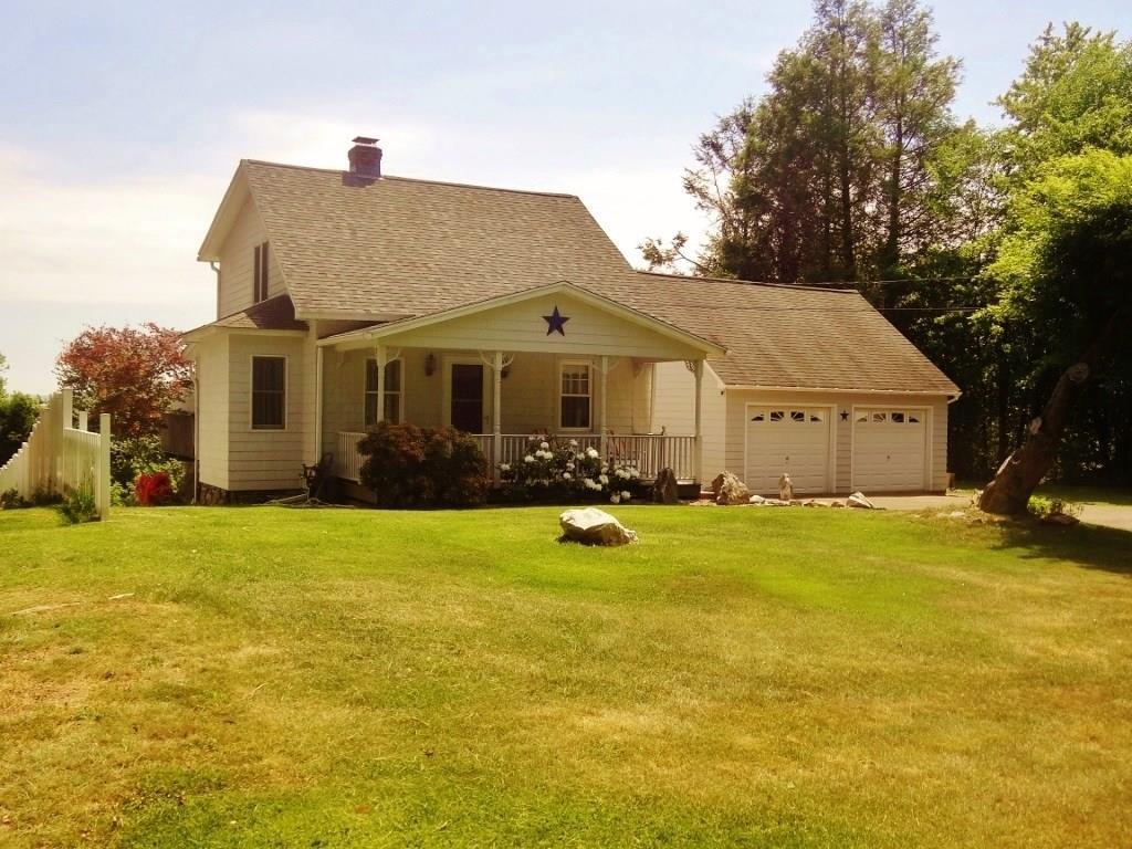 61 Timber Hill Road Cromwell, CT 06416 - Photo 1 of 1 a front view of house with yard and trees