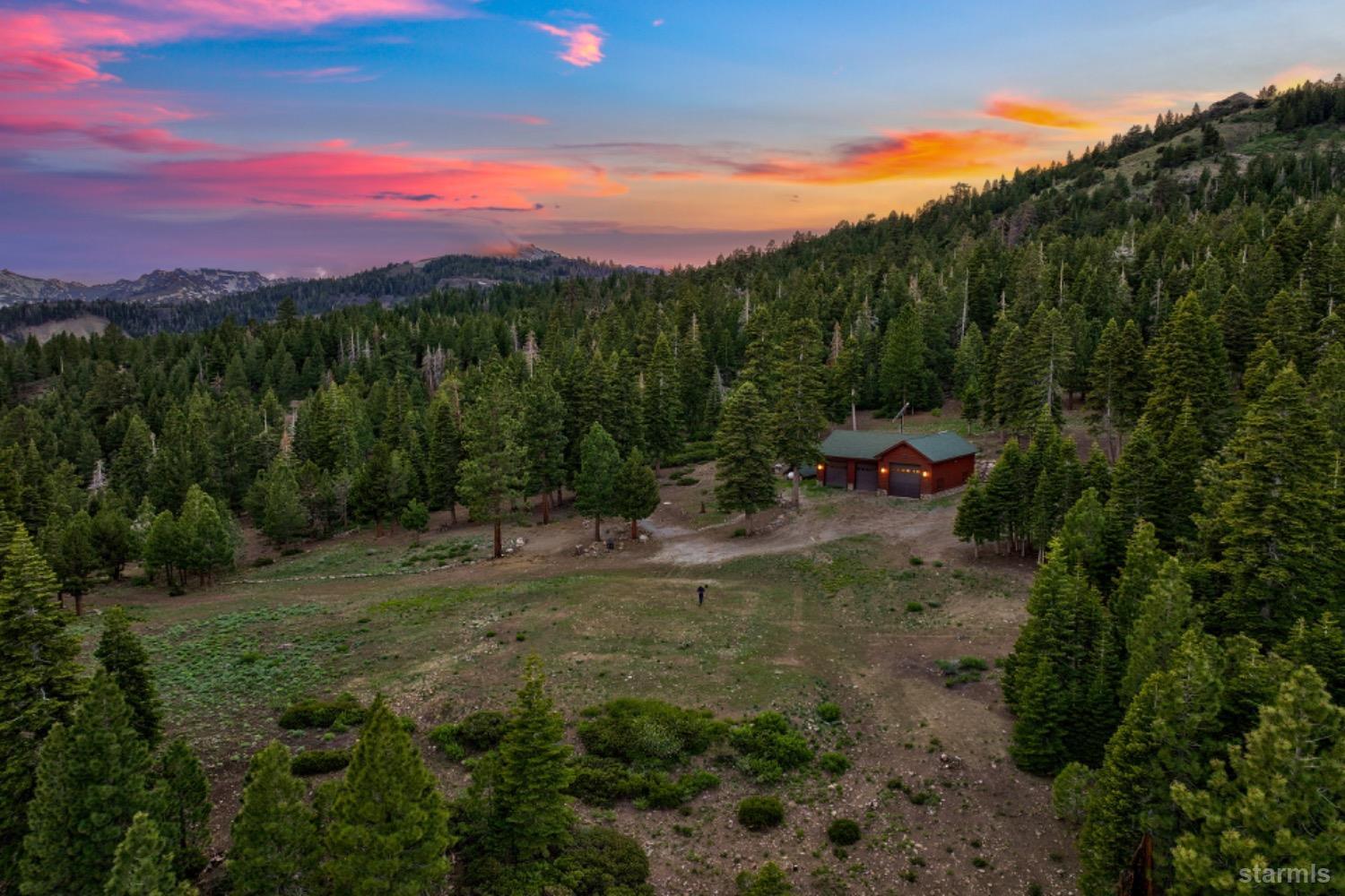 7000 Indian Creek Road Markleeville, CA 96120 - Photo 17 of 39 a view of a lake with a mountain in the background