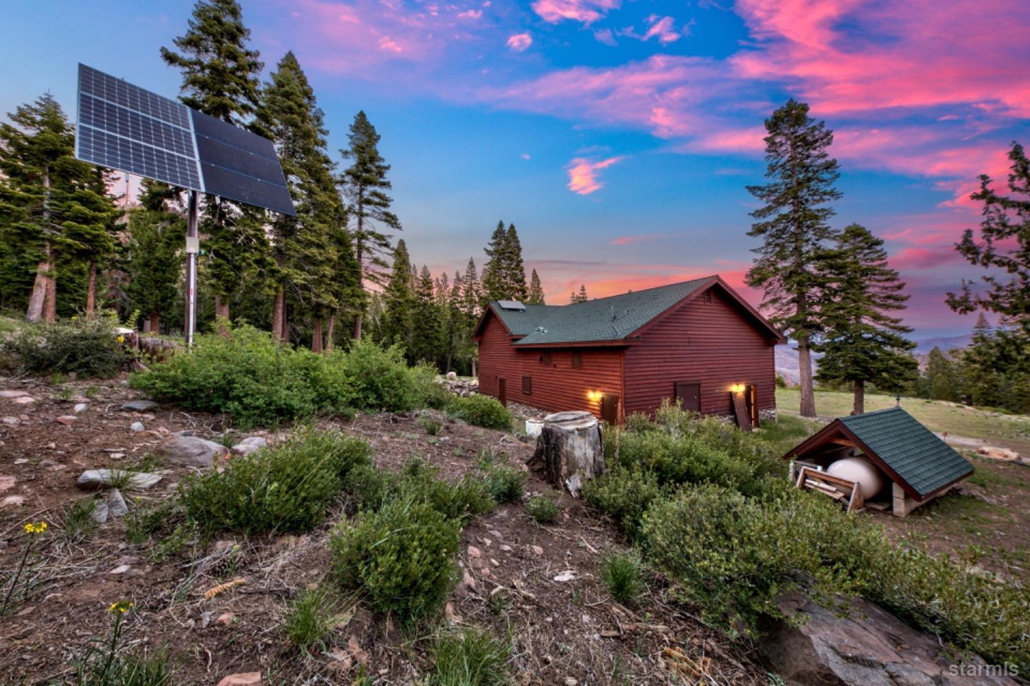 7000 Indian Creek Road Markleeville, CA 96120 - Photo 19 of 39 a view of a house with a yard and garden