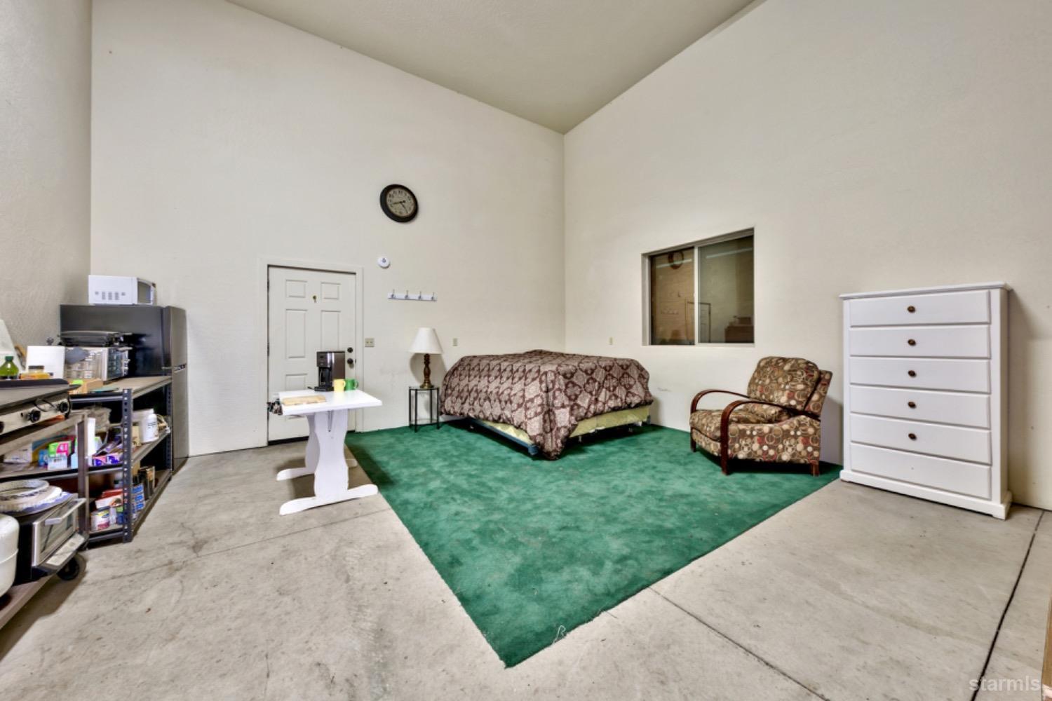 7000 Indian Creek Road Markleeville, CA 96120 - Photo 37 of 39 a living room with furniture and a flat screen tv