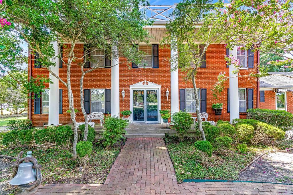 216 McMillen Road Lucas, TX 75002 - Photo 4 of 36 a front view of a multi story residential apartment buildings