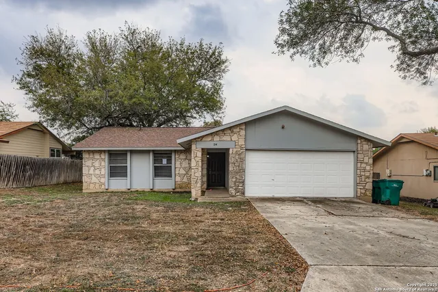front view of a house with a garage