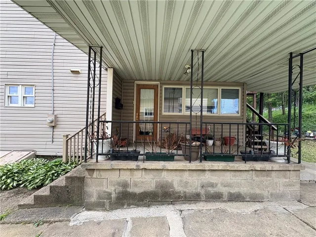 a front view of a house with garage