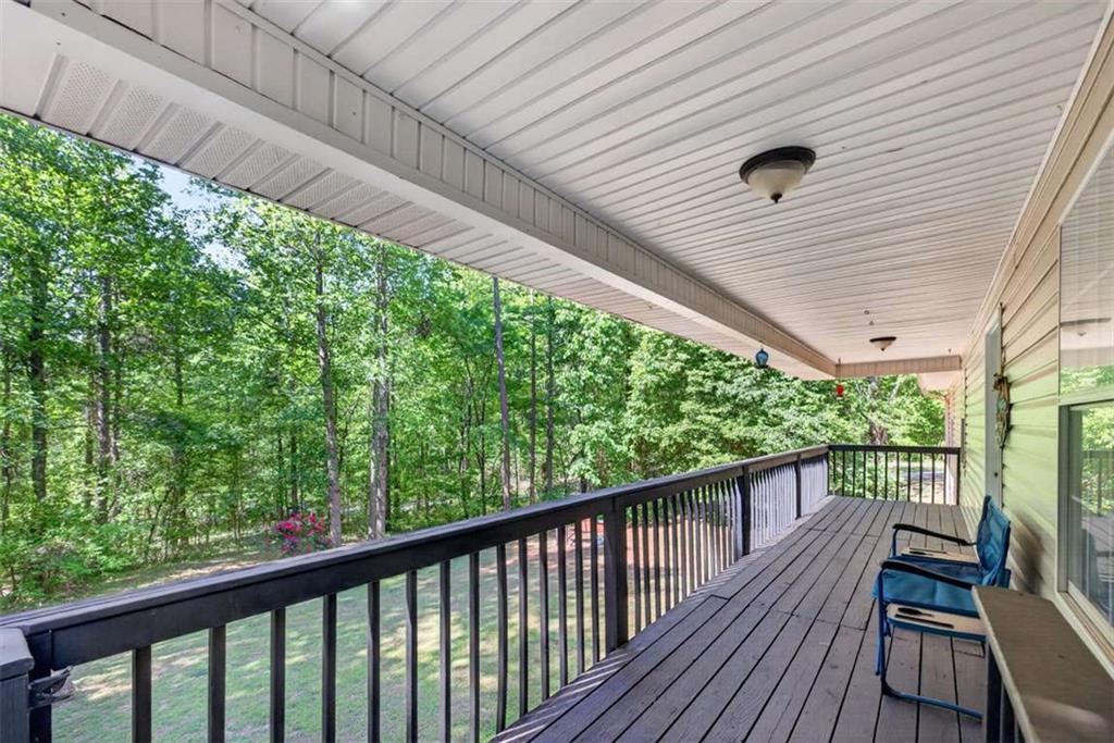 386 Ridgewood Drive Pendergrass, GA 30567 - Photo 6 of 50 a view of balcony with wooden floor