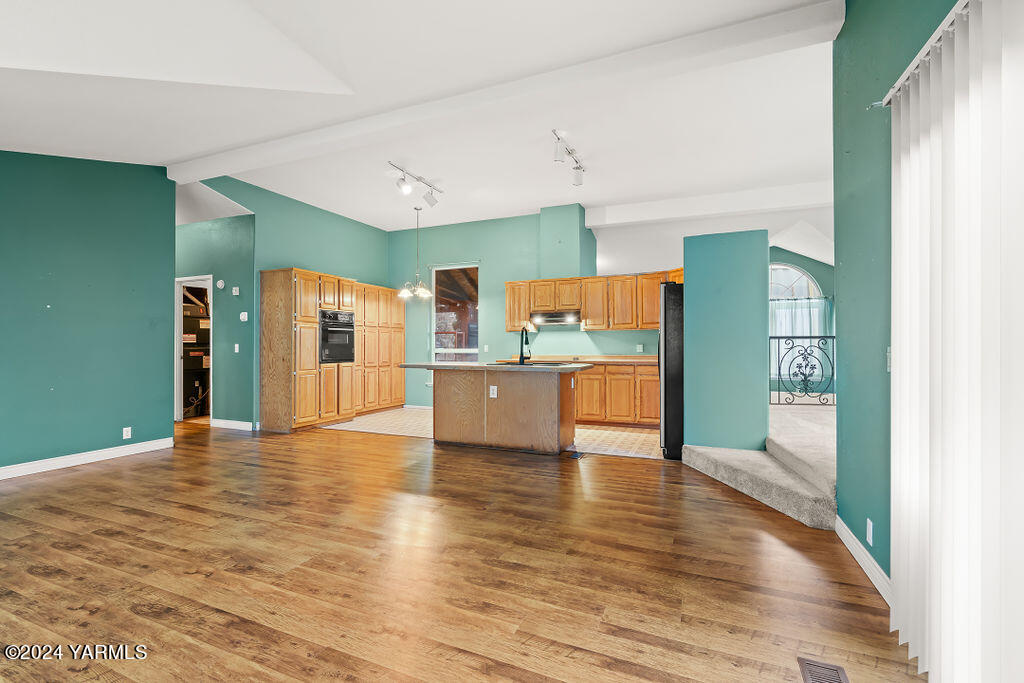 4111 Bell Road Yakima, WA 98901 - Photo 14 of 33 a view of a kitchen with wooden floor