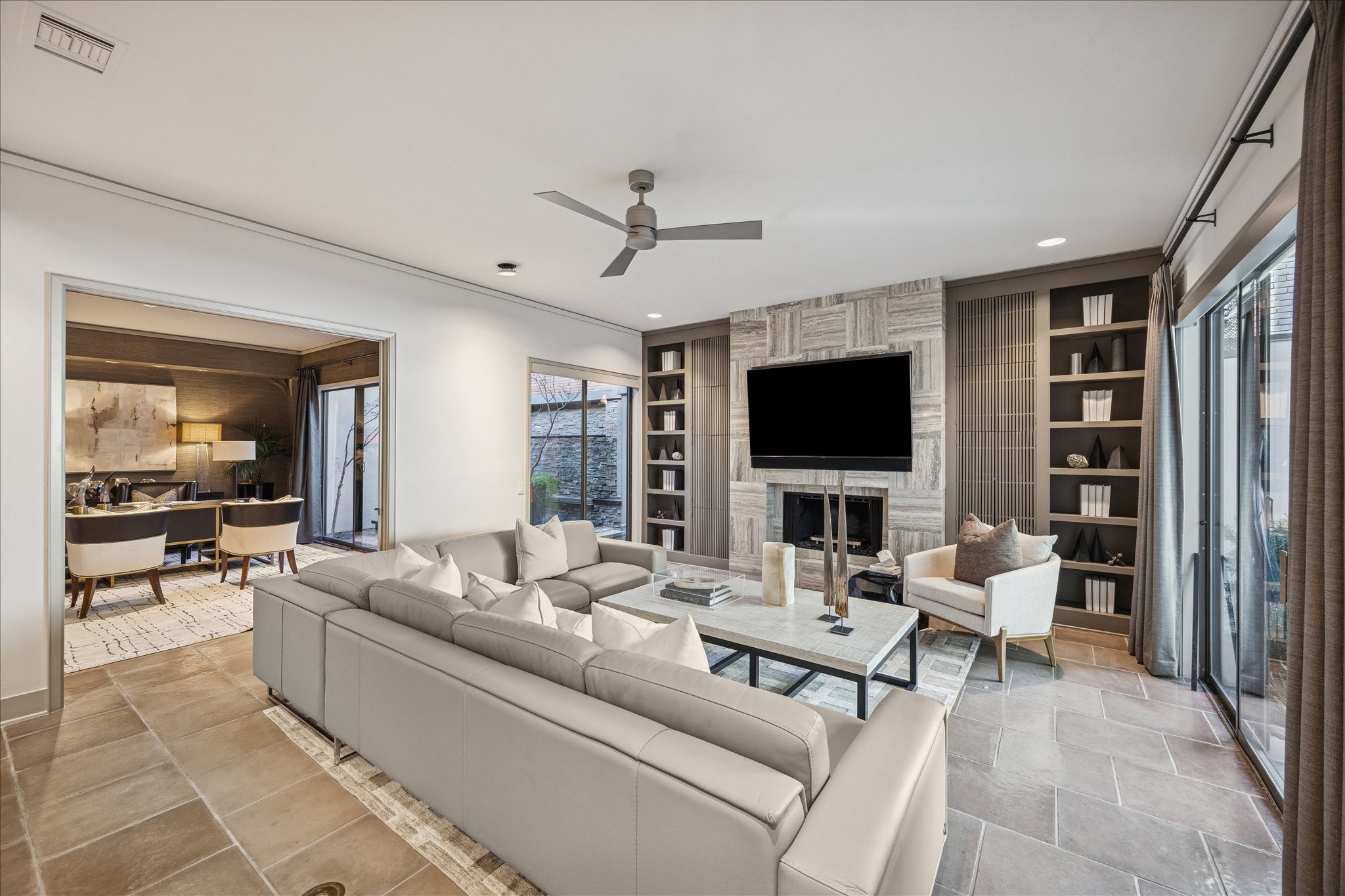 3124 Mid Lane Houston, TX 77027 - Photo 14 of 41 a living room with furniture and a flat screen tv