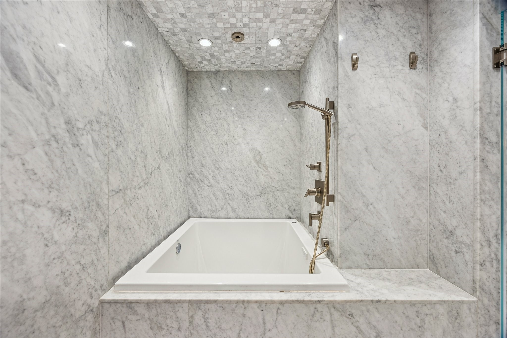 3124 Mid Lane Houston, TX 77027 - Photo 27 of 41 a bathroom with a bath tub