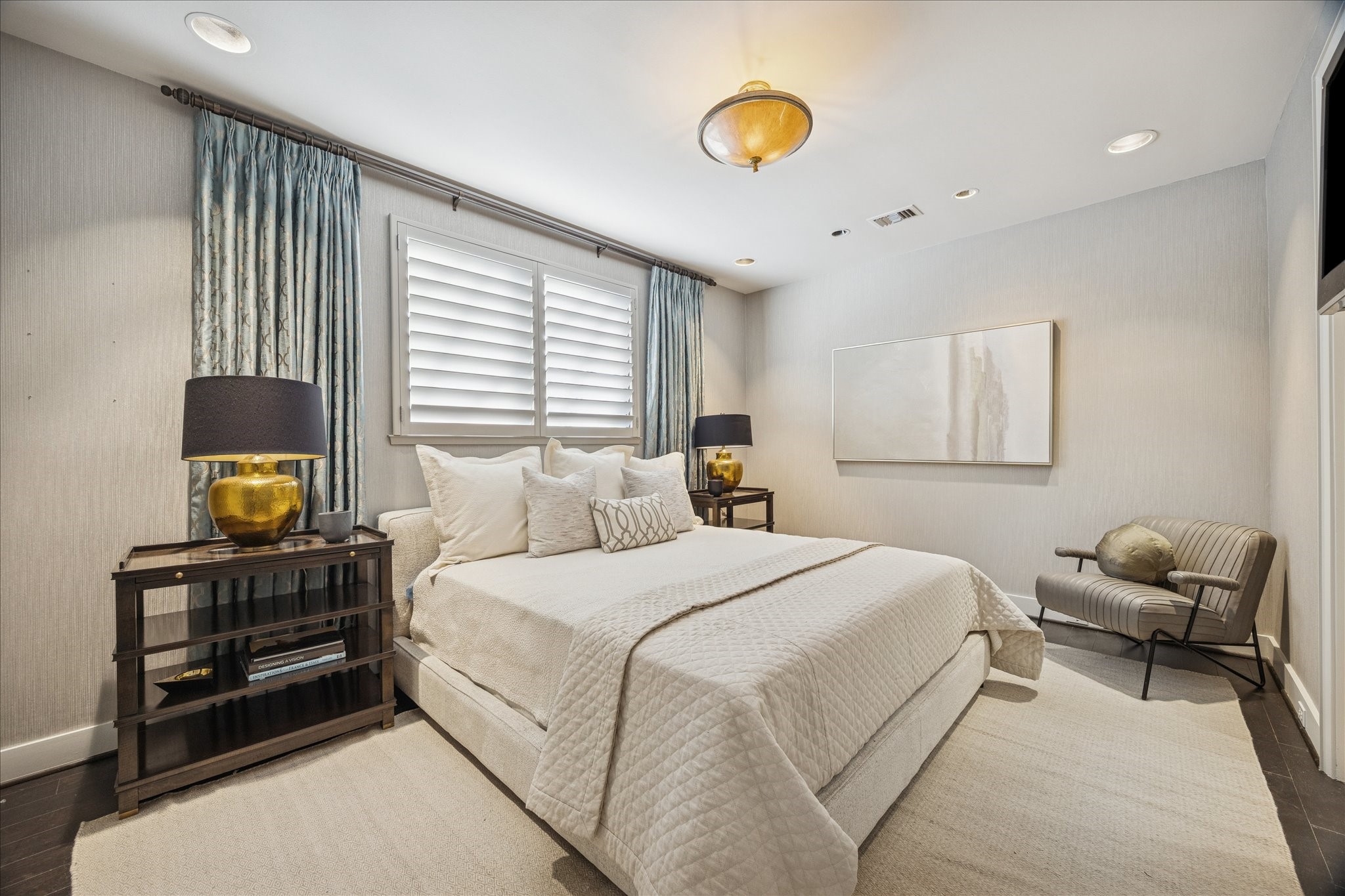 3124 Mid Lane Houston, TX 77027 - Photo 30 of 41 a bedroom with a bed and chair