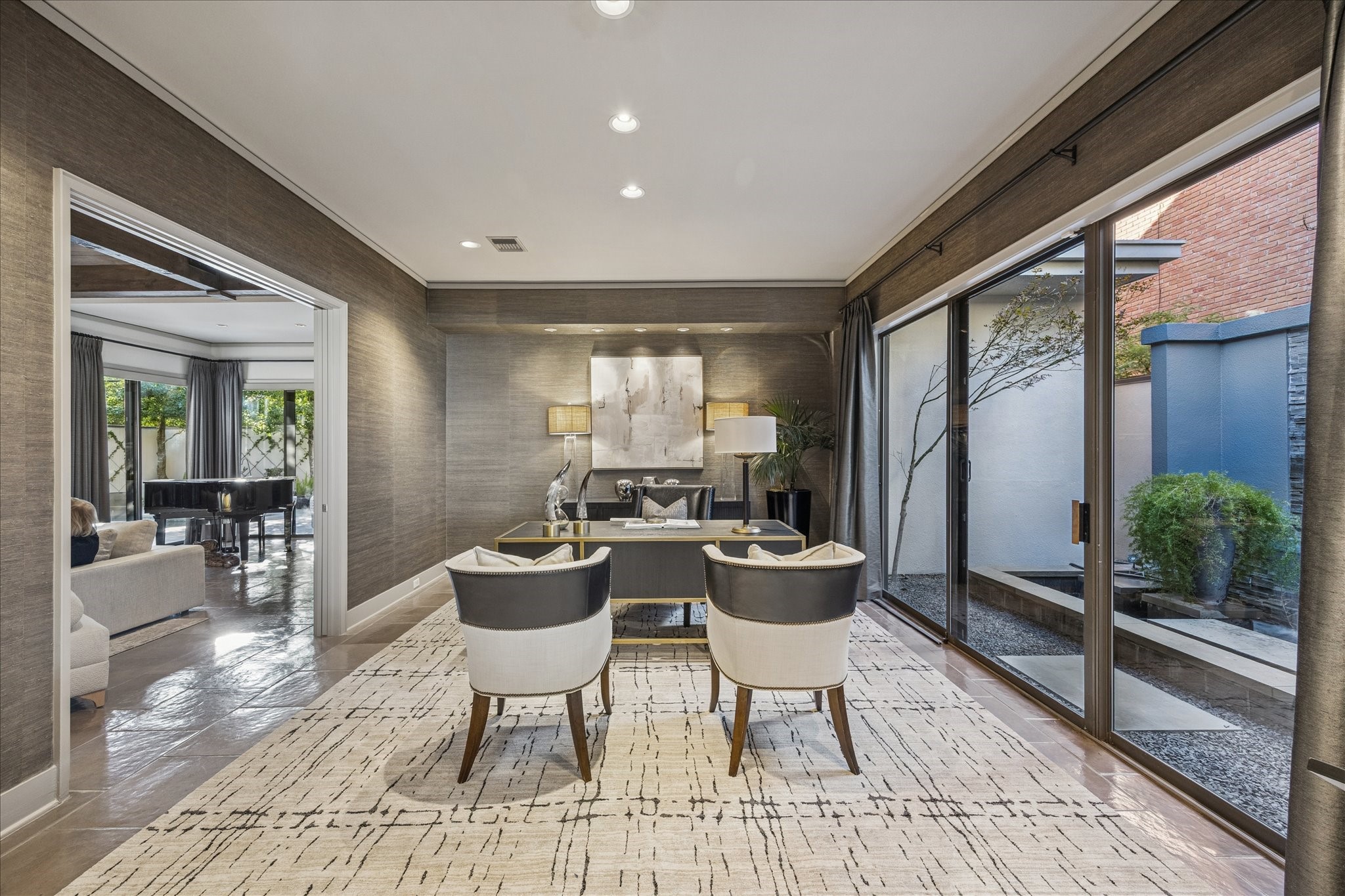3124 Mid Lane Houston, TX 77027 - Photo 10 of 41 a dining room with furniture and a large window