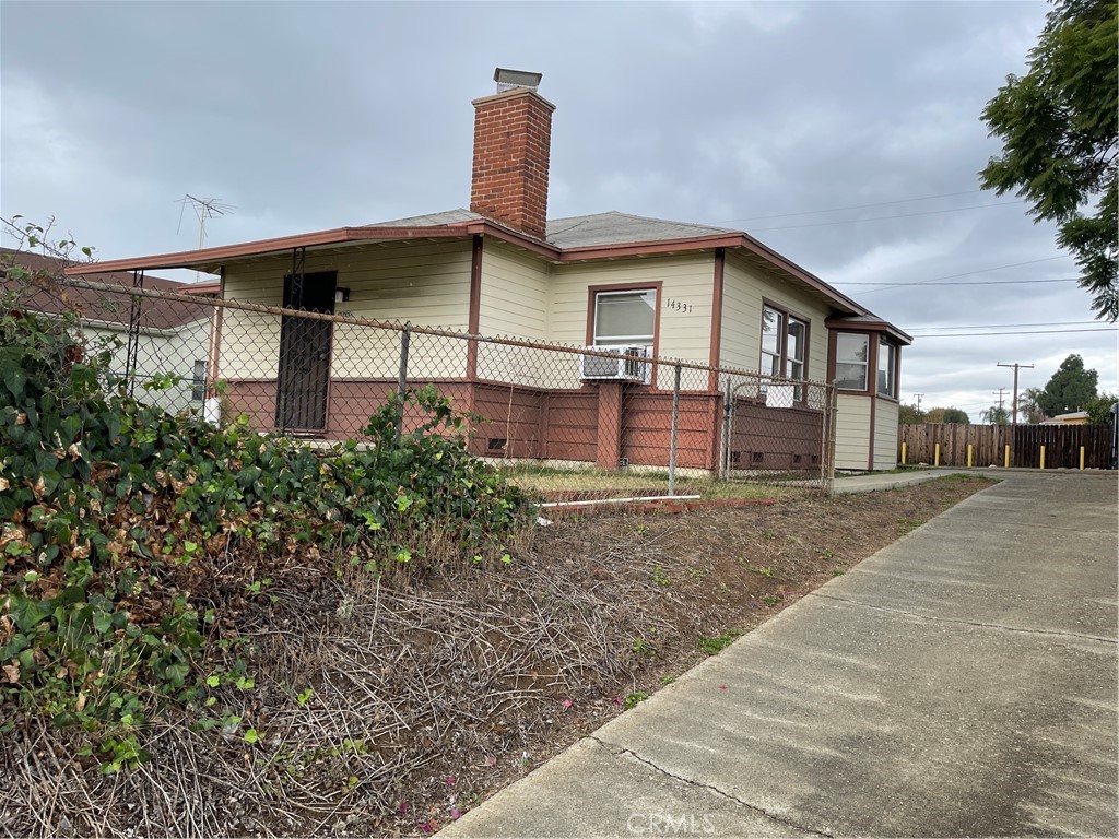 14331 Leffingwell Road Whittier, CA 90604 - Photo 1 of 1 a front view of a house with a yard