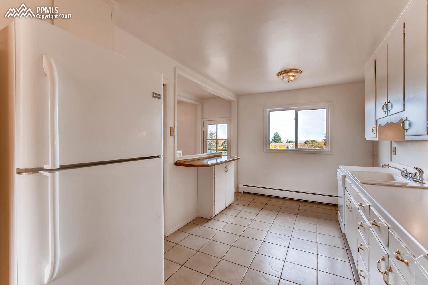 171 Clarksley Road Manitou Springs, CO 80829 - Photo 7 of 25 Kitchen exits out to the deck area