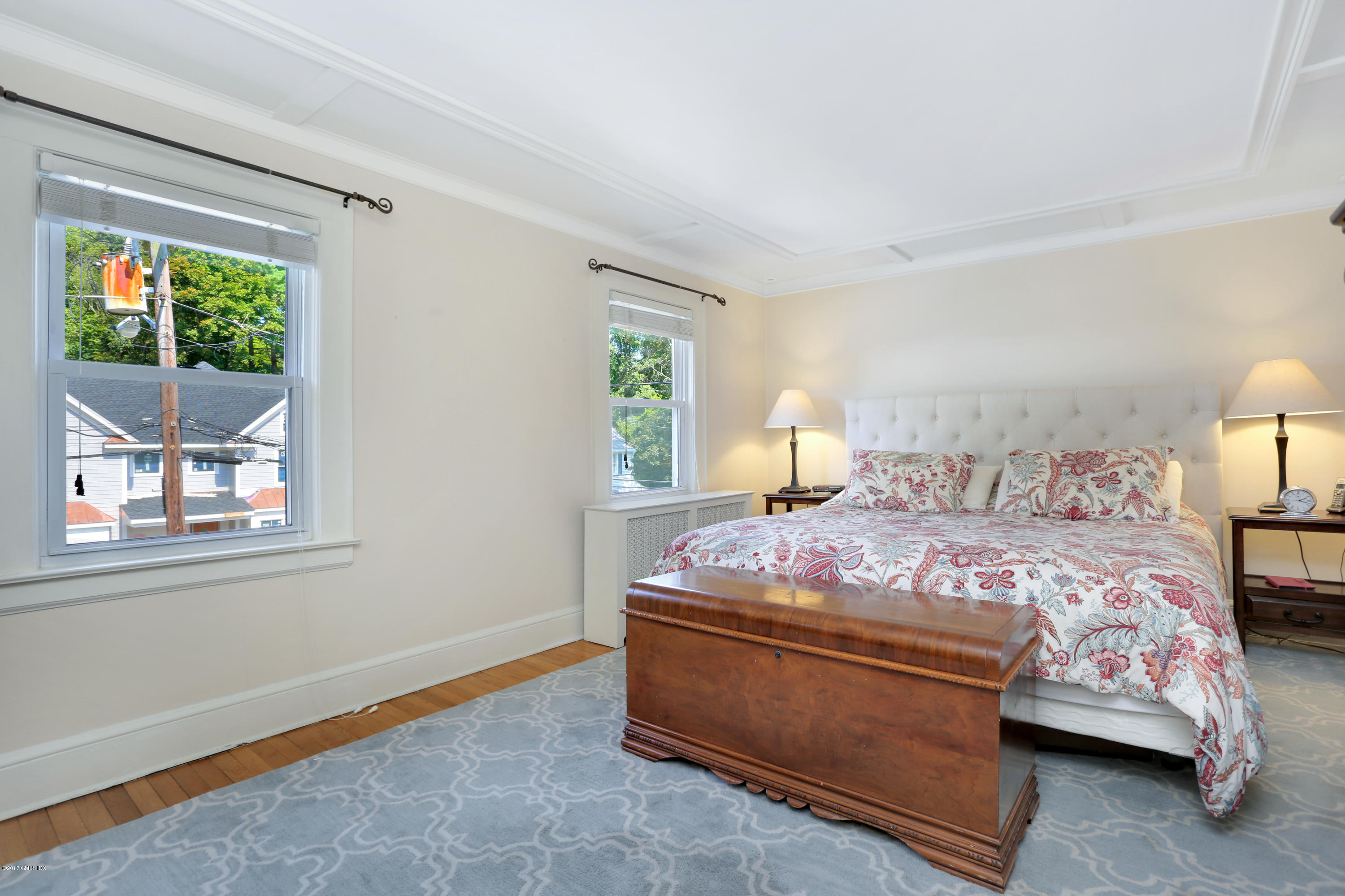 27 Pleasant Street Cos Cob, CT 06807 - Photo 14 of 21 a bedroom with a bed and window