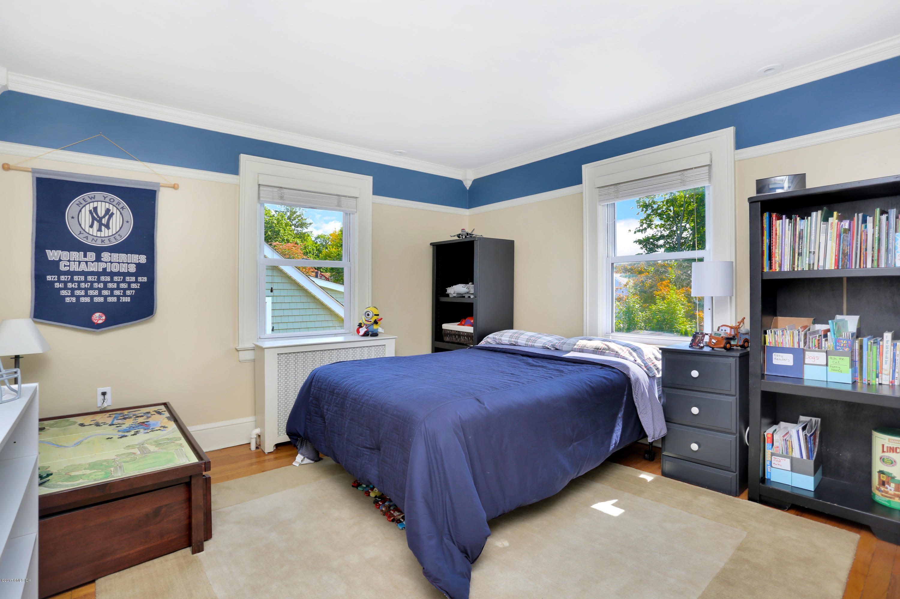 27 Pleasant Street Cos Cob, CT 06807 - Photo 15 of 21 a bedroom with a bed and furniture