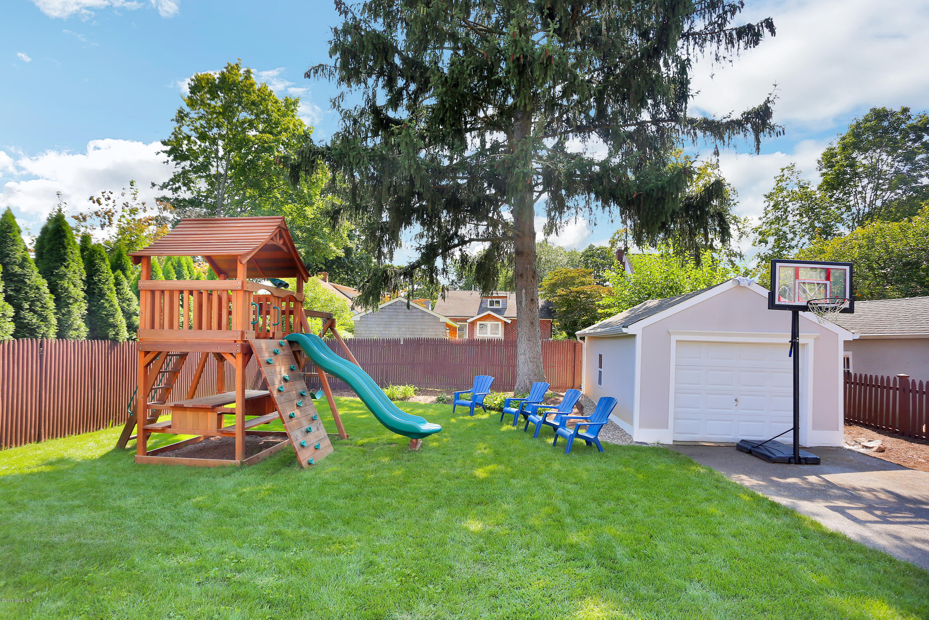 27 Pleasant Street Cos Cob, CT 06807 - Photo 18 of 21 a view of a house with a park
