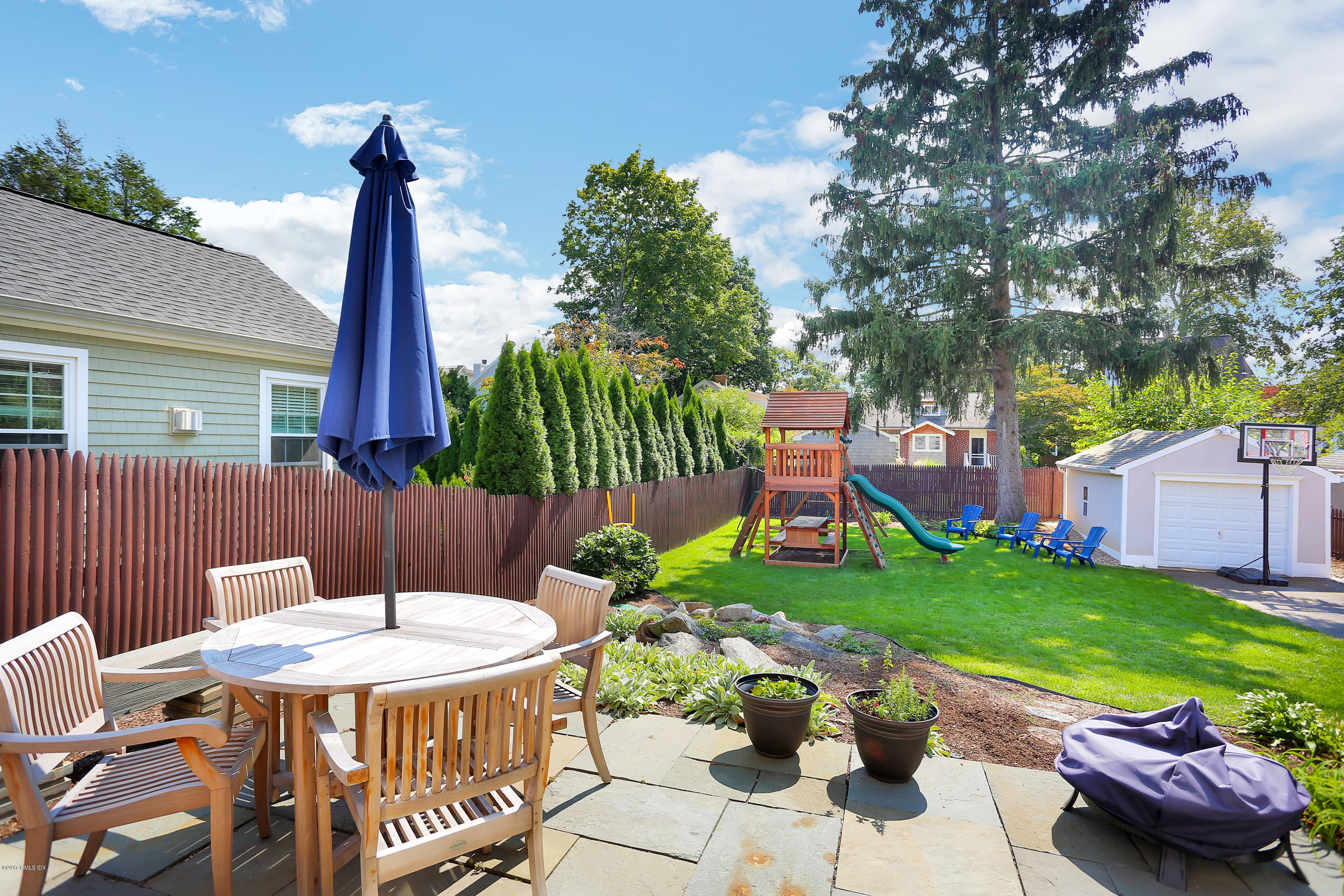 27 Pleasant Street Cos Cob, CT 06807 - Photo 20 of 21 a view of a table and chairs in patio