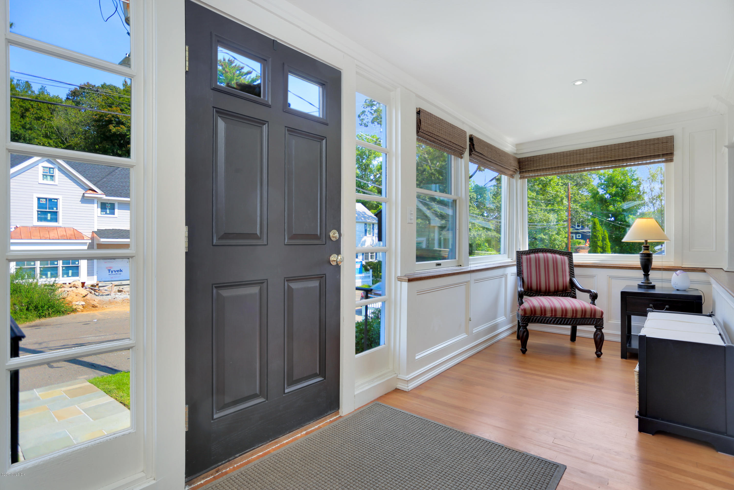 27 Pleasant Street Cos Cob, CT 06807 - Photo 3 of 21 a view of a livingroom with furniture and a window