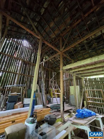 a view of swimming pool with seating area