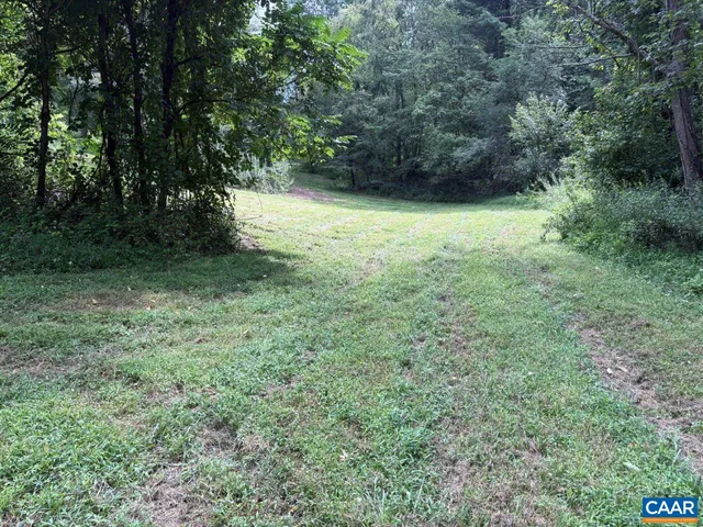 a view of an outdoor space and a yard