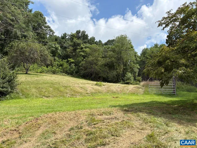 a view of a yard with an trees