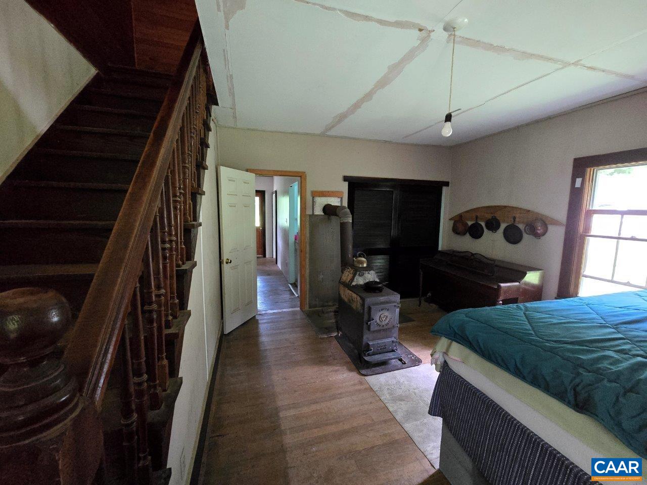 8947 Sugar Run Road Northeast Copper Hill, VA 24079 - Photo 26 of 28 a view of a livingroom with furniture and a window