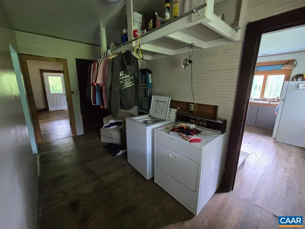 a storage room with washer and dryer