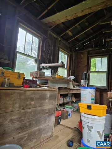a kitchen with stove and window