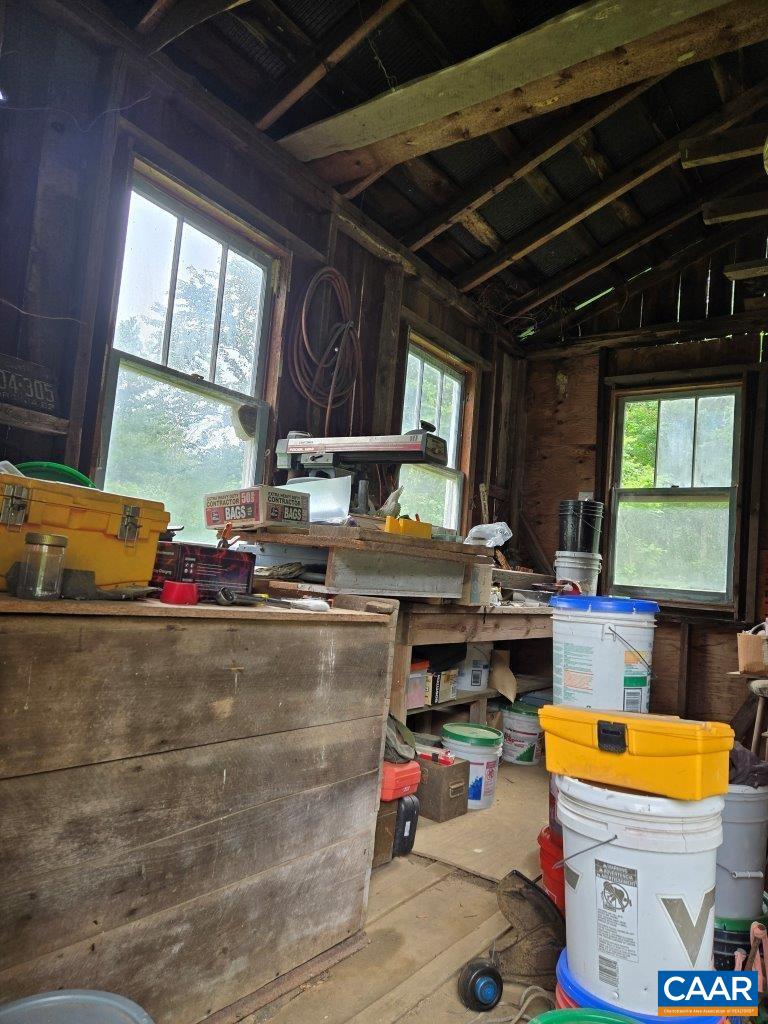 8947 Sugar Run Road Northeast Copper Hill, VA 24079 - Photo 8 of 28 a kitchen with stove and window