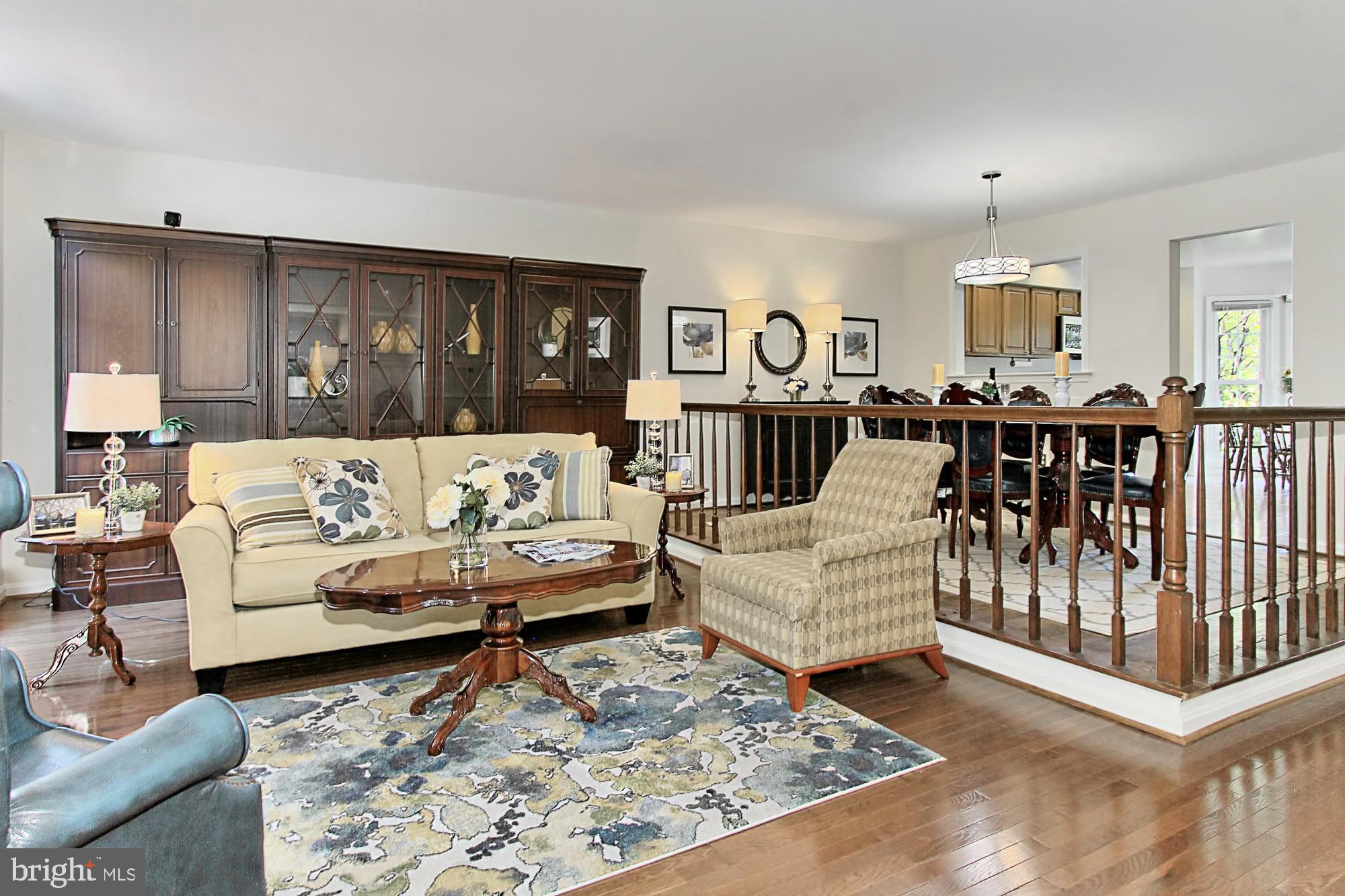 7469 Ridge Oak Court Springfield, VA 22153 - Photo 6 of 18 The living room has a treed view.