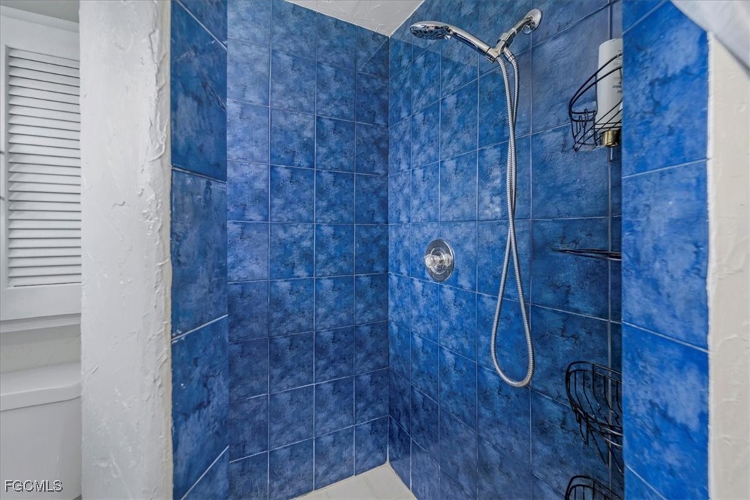 1083 Sunset Strip Moore Haven Okeechobee, FL 34974 - Photo 21 of 48 a bathroom with a shower