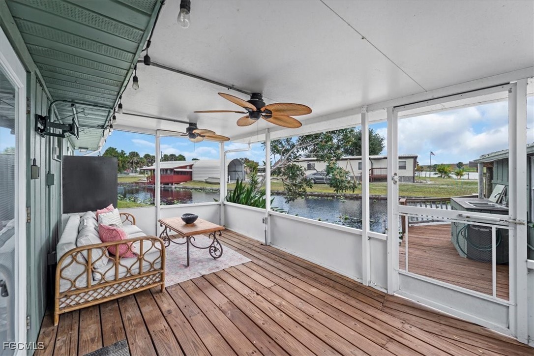 1083 Sunset Strip Moore Haven Okeechobee, FL 34974 - Photo 30 of 48 a view of a patio with table and chairs