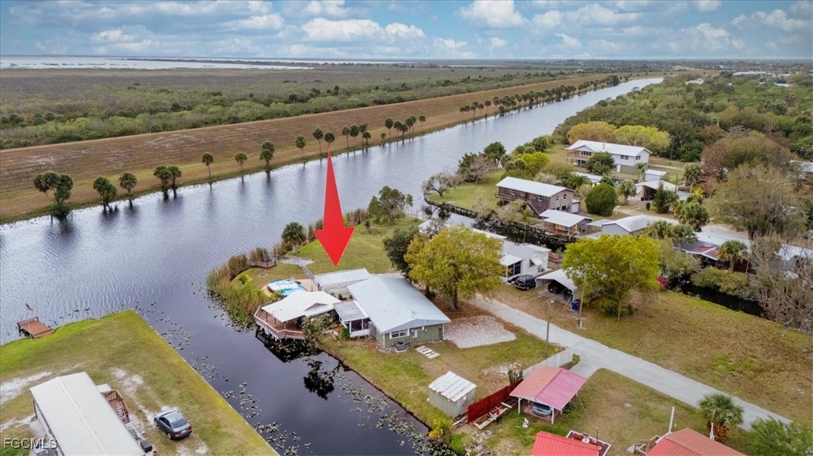 1083 Sunset Strip Moore Haven Okeechobee, FL 34974 - Photo 48 of 48 an aerial view of a house with a ocean view