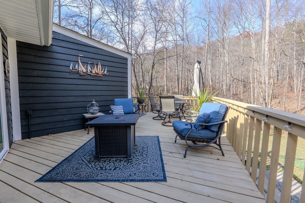 3301 Ellington Road Hayesville, NC 28904 - Photo 11 of 31 a view of a chairs on the roof deck