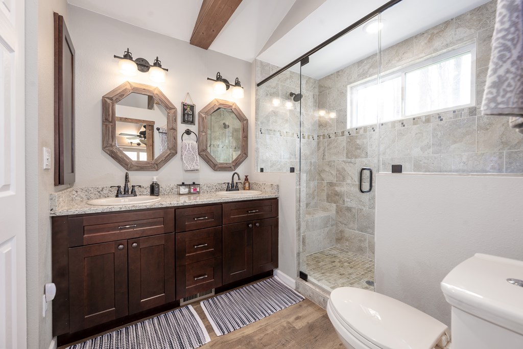 3301 Ellington Road Hayesville, NC 28904 - Photo 14 of 31 a bathroom with a double vanity sink mirror and toilet