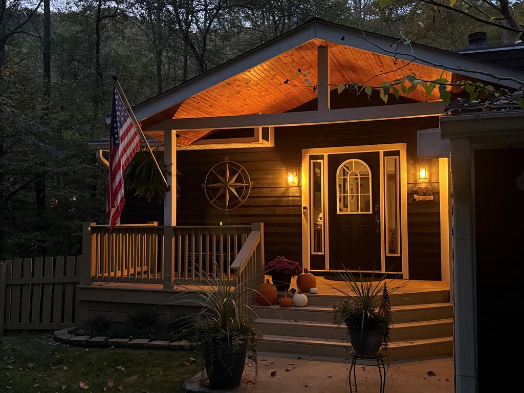 3301 Ellington Road Hayesville, NC 28904 - Photo 22 of 31 a view of front door and deck with furniture