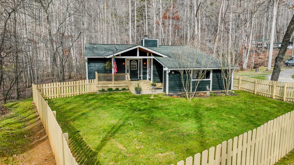 3301 Ellington Road Hayesville, NC 28904 - Photo 23 of 31 a front view of a house with a yard