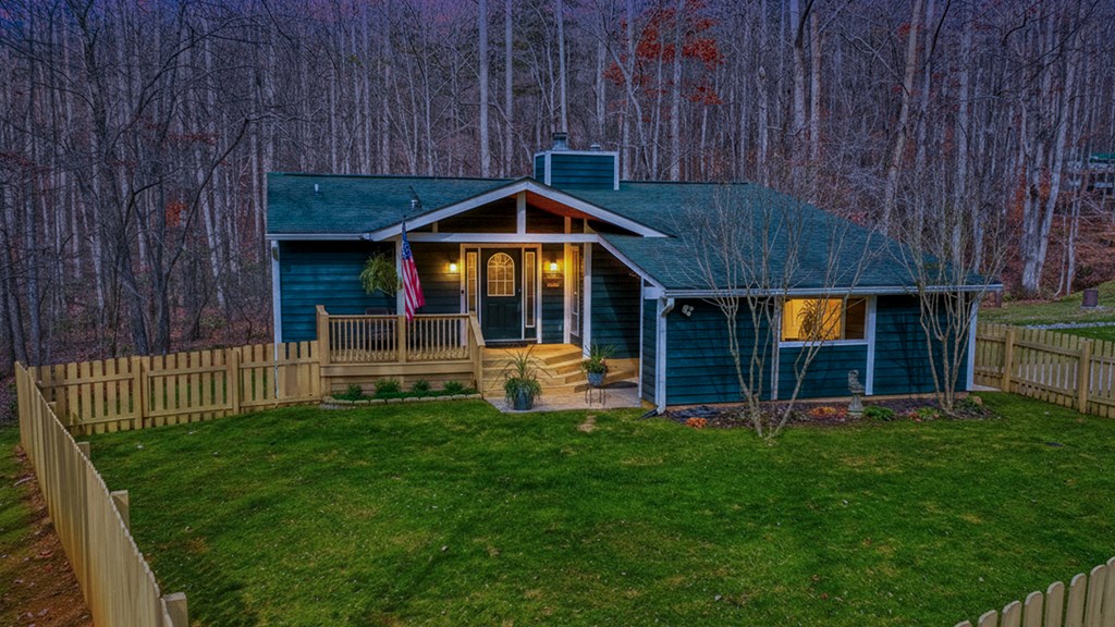 3301 Ellington Road Hayesville, NC 28904 - Photo 3 of 31 a view of an house with backyard and deck